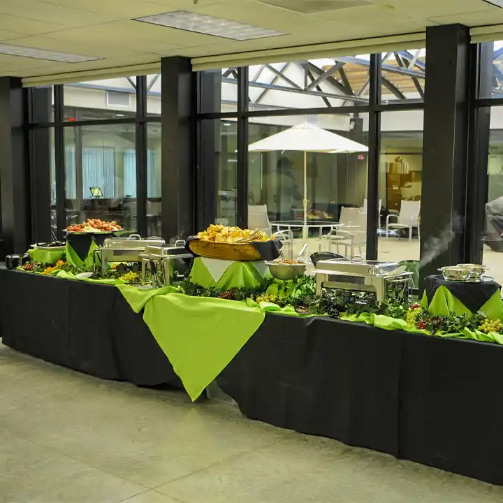 black and green corporate mesa catering buffet