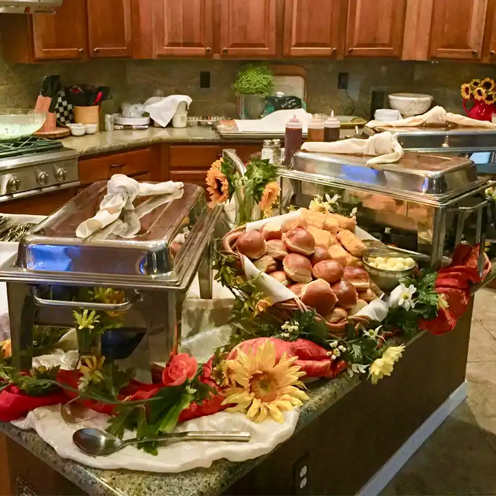 tempe catering buffet decorated with red and white linens