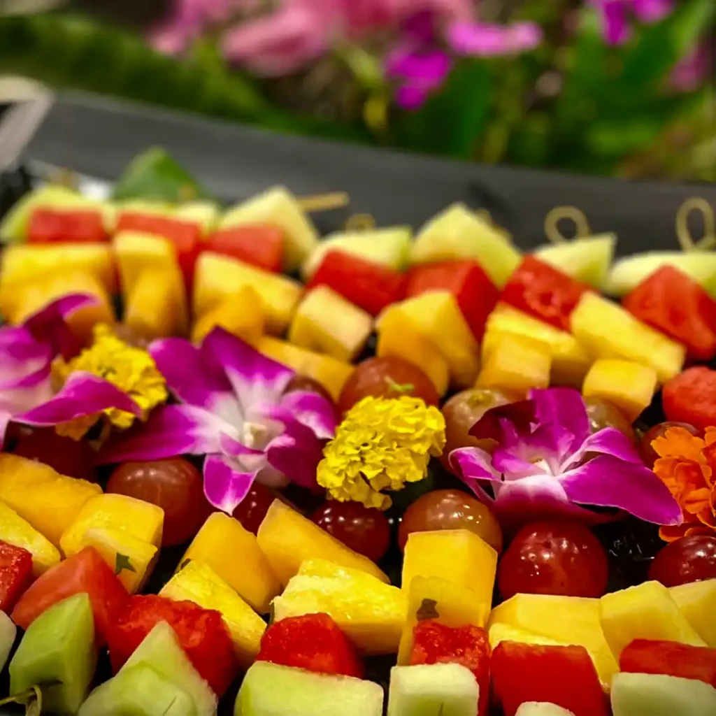 plattered tropical fruit skewers