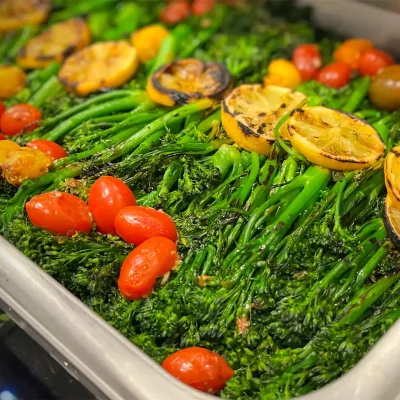brocolini bunches in a chaffer on a buffet in scottsdale arizona